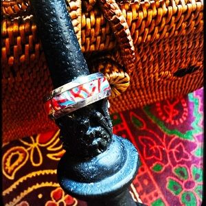 Ring: Silver polished with inlaid abalone, dyed with red, ivory & skyblue.